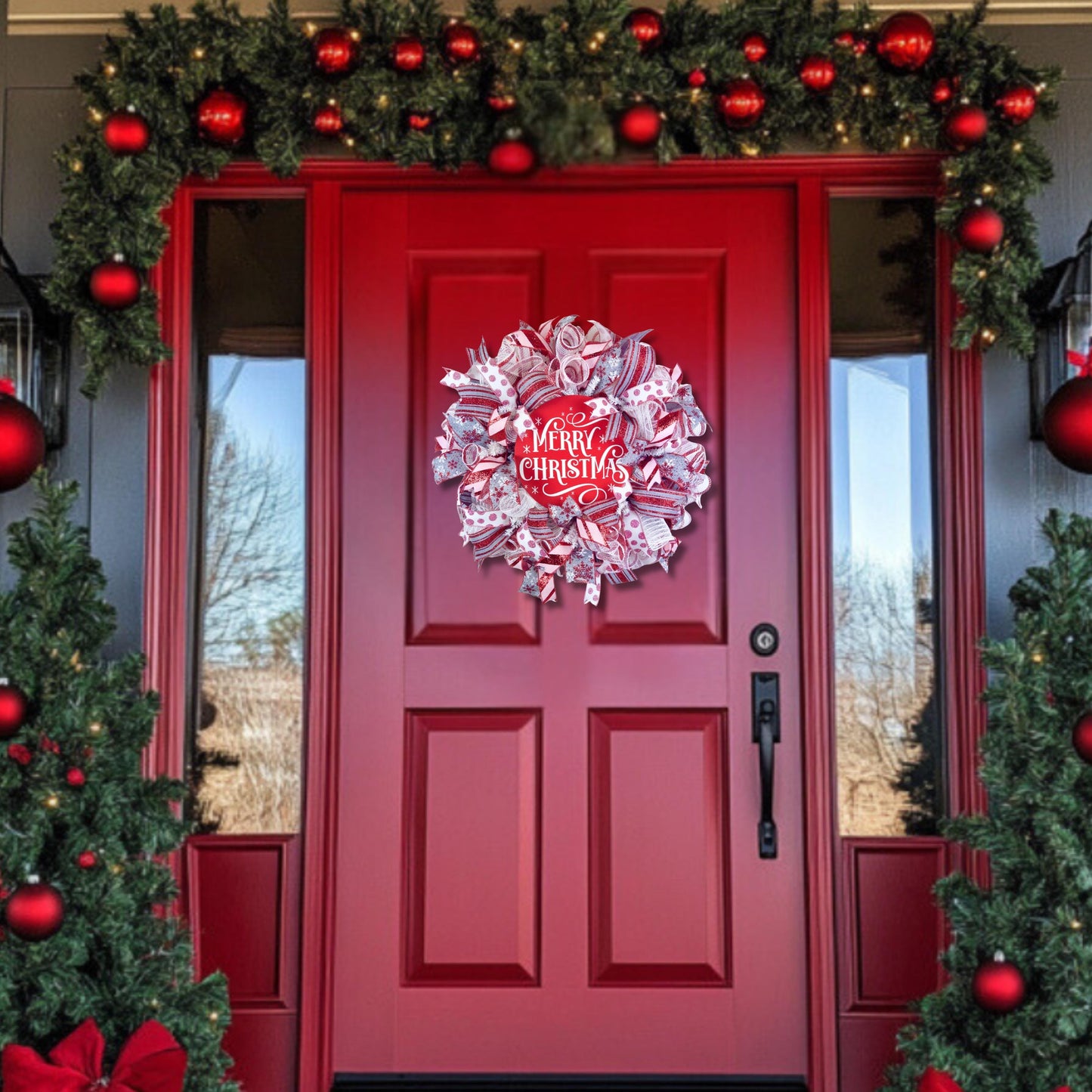Oversized Christmas wreath with glitter ribbon and festive sign for winter entryway decor