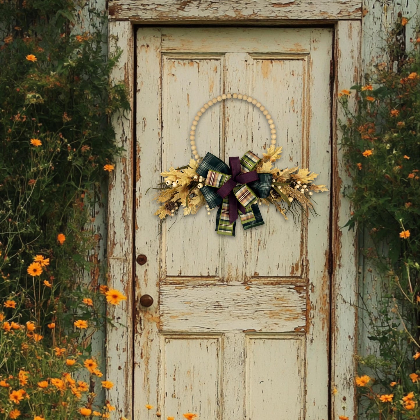 Final angle of fall wreath displaying overall construction and balance of floral and bow elements for home decor.