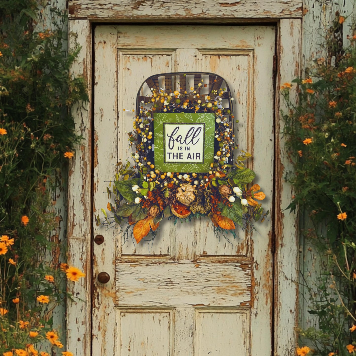 Farmhouse fall door wreath on rustic white entryway with autumn florals and harvest colors