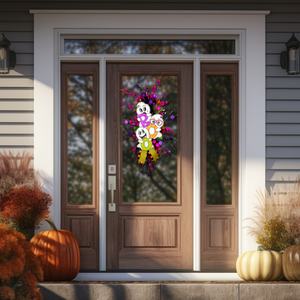 Colorful Halloween door swag with 'Boo' sign and vibrant purple, hot pink, and lime green ribbon, perfect for Halloween wall or door decor.