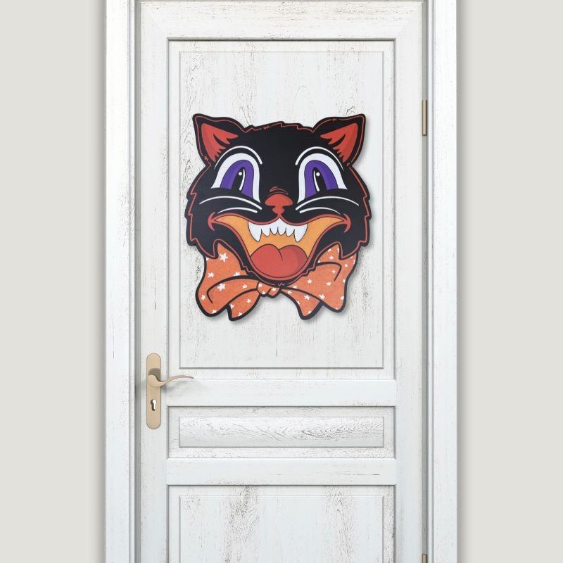 Black Cat Door Hanger displayed on a white door, adding spooky charm to Halloween decorations. Perfect for homes, walls, or entryways.