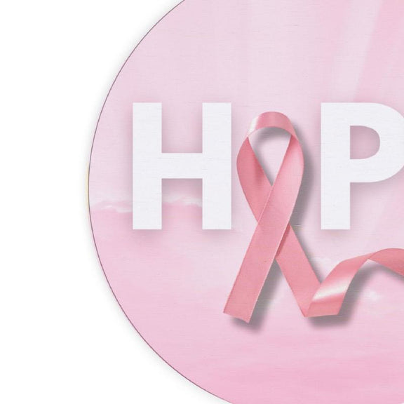 Wall hanging with a pink ribbon and HOPE inscription for breast cancer support