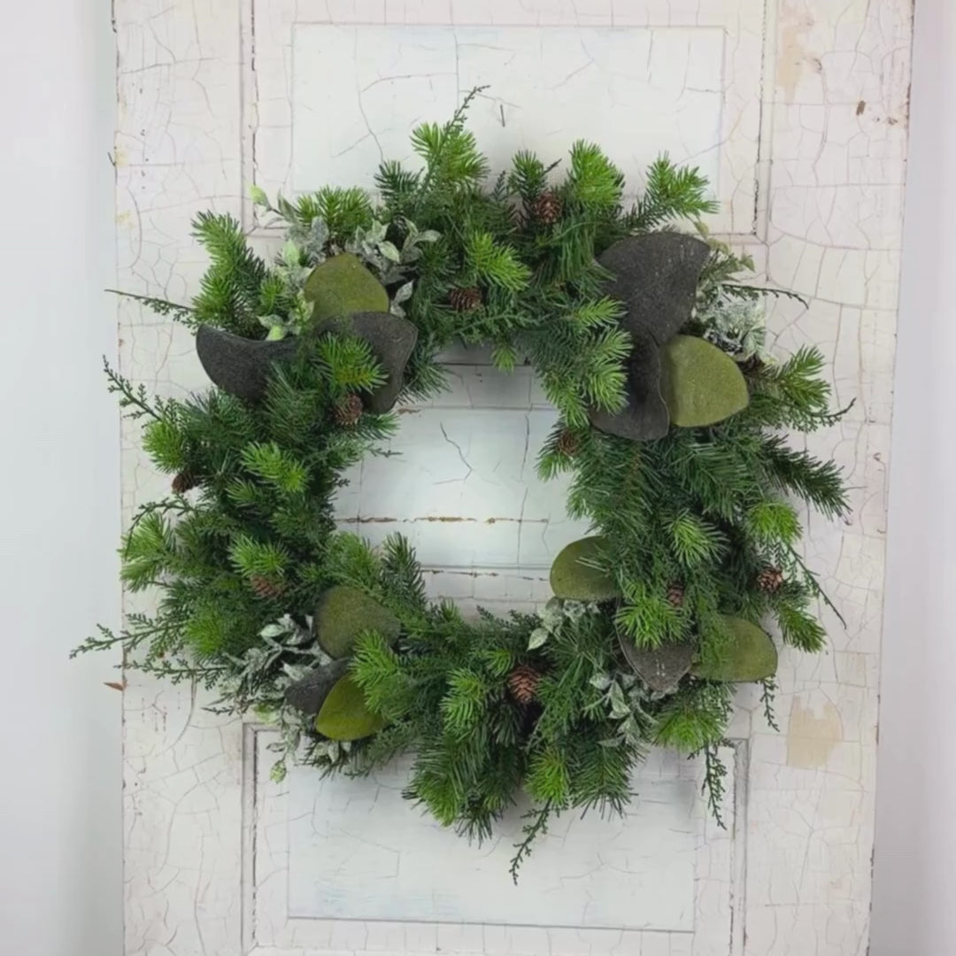 Video highlighting a detailed, 360-degree view of a rustic winter wreath featuring realistic evergreen branches, perfect for festive seasonal decor.