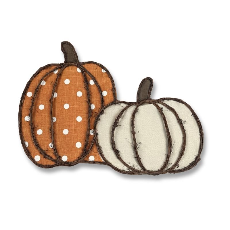 Rustic Pumpkin Door Hanger made with a grapevine frame, featuring orange polka dot and beige fabric pumpkins. Perfect for fall harvest door or wall decor.