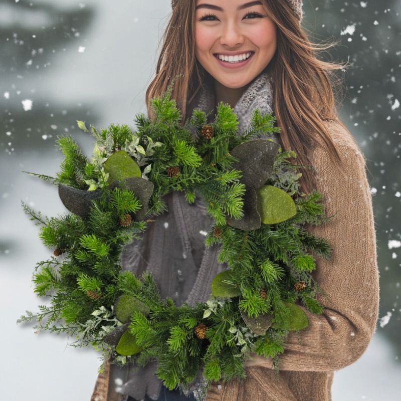 Woman holding a 26